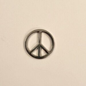 Silver tone peace charm